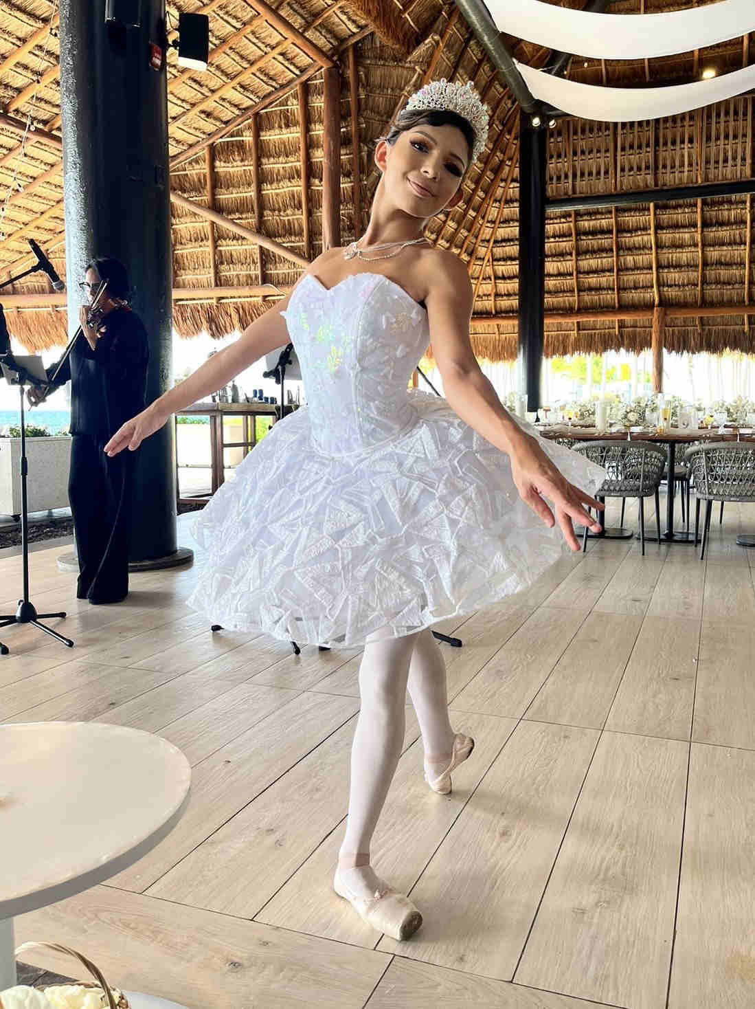 Naty in white balette pose